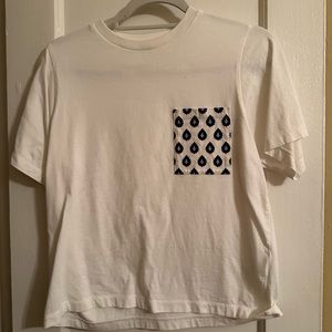 A designed pocket on a basic white tee